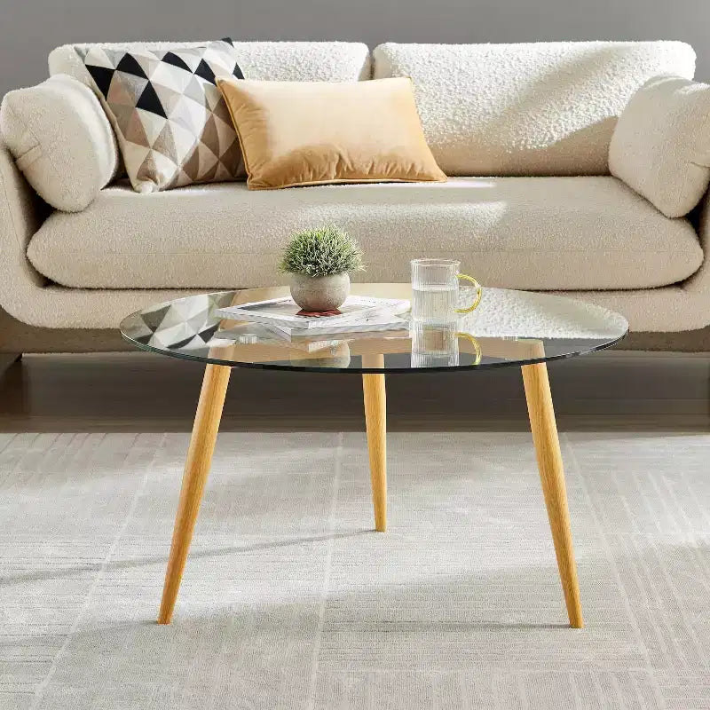 Table basse ronde moderne du milieu du siècle avec plateau en verre
