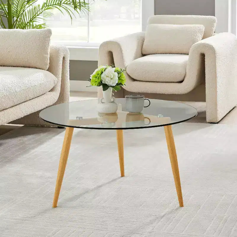 Table basse ronde moderne du milieu du siècle avec plateau en verre