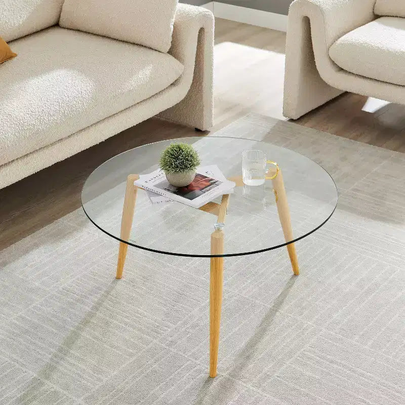 Table basse ronde moderne du milieu du siècle avec plateau en verre