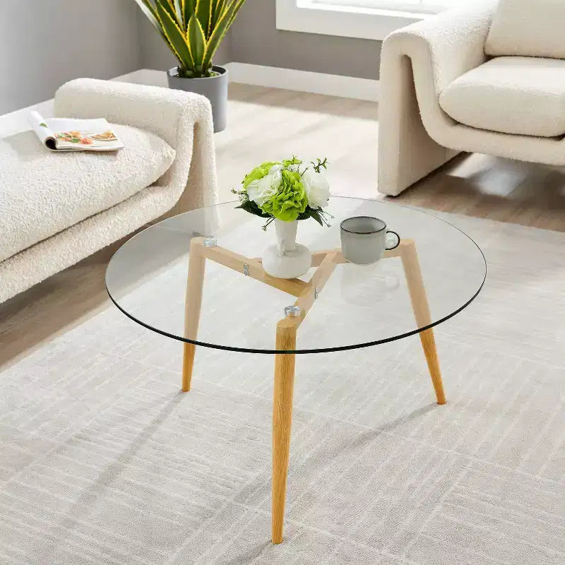 Table basse ronde moderne du milieu du siècle avec plateau en verre