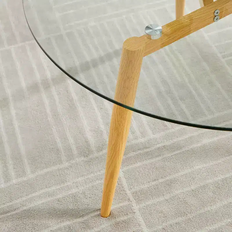 Table basse ronde moderne du milieu du siècle avec plateau en verre